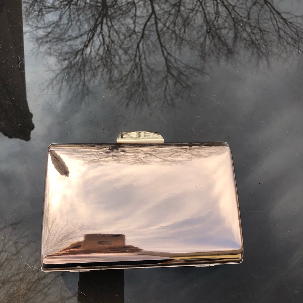 Rose gold metallic evening clutch bag